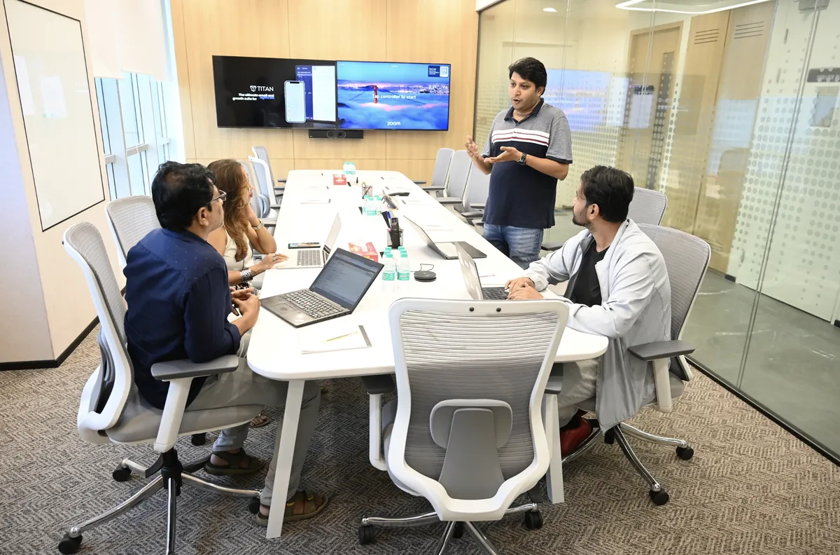 A team reviewing work together in a meeting room